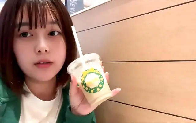 She nearly gets caught by the woman next door while moaning in the toilet stall