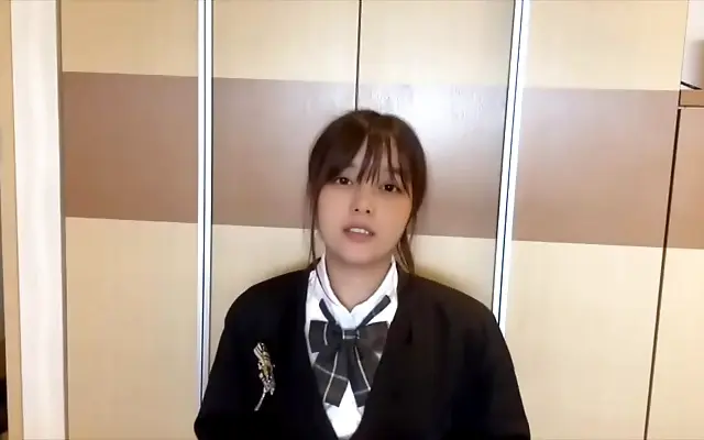 Sunlight streams through sheer curtains as shy Japanese girl pleasures herself