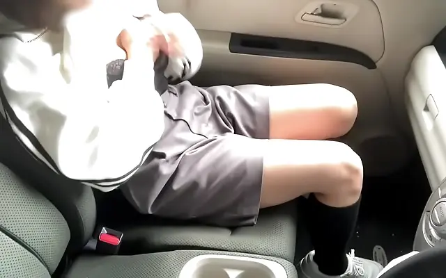 Japanese teen with a delicate belly piercing pleasures herself in the forest car