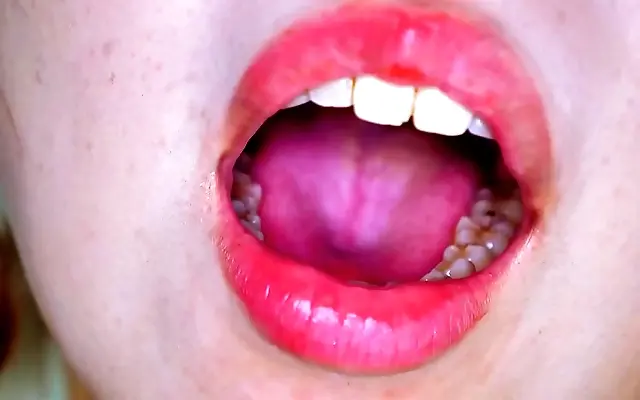 In a dim Tokyo bedroom, passionate lovers dive into sensual mouth and tongue play